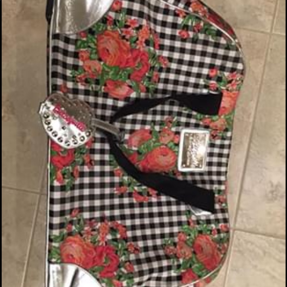 Betsy Johnson rollable luggage
